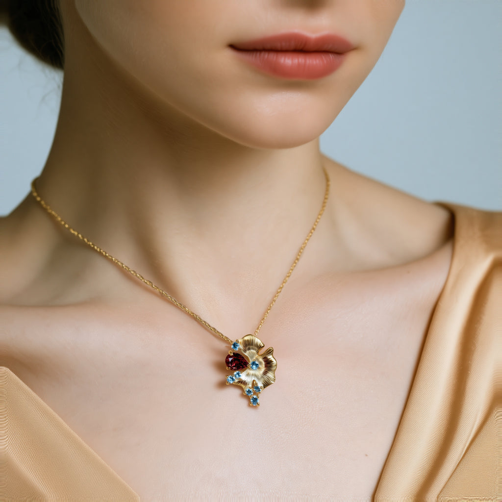 Red Garnet & Blue Topaz Pendant worn